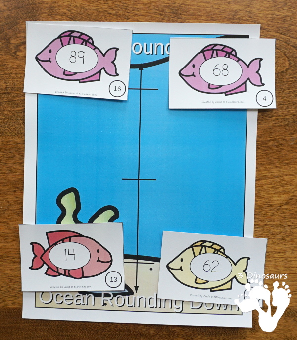 Free Ocean Fish Rounding by Place Value - 3 levels of fish with a recording sheet and rounding mats all to help with different levels of rounding - #freeprintable #mathforkids  #3dinosaurs