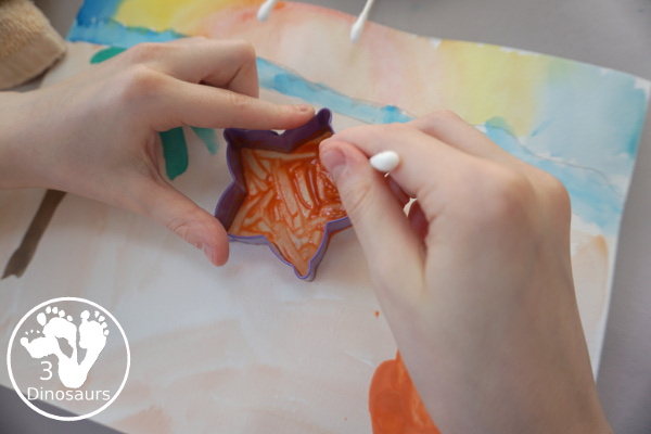 Beach Watercolor and Q-Tip Shell Painting - this is a great painting project that many ages can do. It is loads of fun for painting and fine motor work. - 3Dinosaurs.com