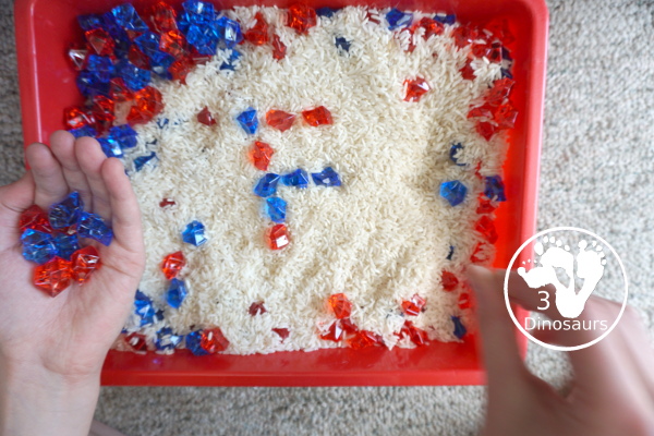 Red White and Blue Sensory Bin for the Fourth of July - a super easy to set up red, white, and blue sensory for the fourth of July and flag day with three times for the sensory bin. - 3Dinosaurs.com
