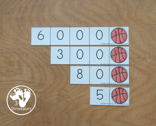 Free Basketball Place Value Arrow Cards - you have place value task cards with basketball place value arrow cards to build the numbers on the task cards. You have place value for thousands, hundreds, and ones. - 3Dinosaurs.com