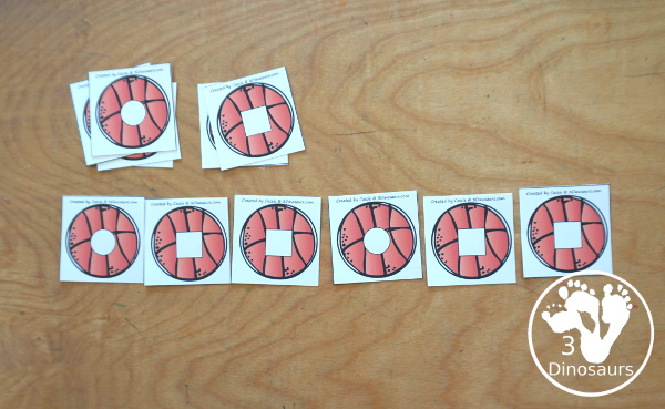 Free Basketball Shape Sorting Printable  has sorting for four shapes: circle, square, triangle, rectangle. There are four sorting mats and 6 basketballs for each mat to sort  - 3Dinosaurs.com