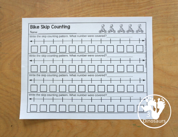 Free Bike Skip Counting Number Line Printables - skip counting number line strips with 2, 5 and 10 skip counting. With kids on bikes covering some of the numbers. With four skip counting strips for each number and a matching worksheet to record the numbers.- 3Dinosaurs.com