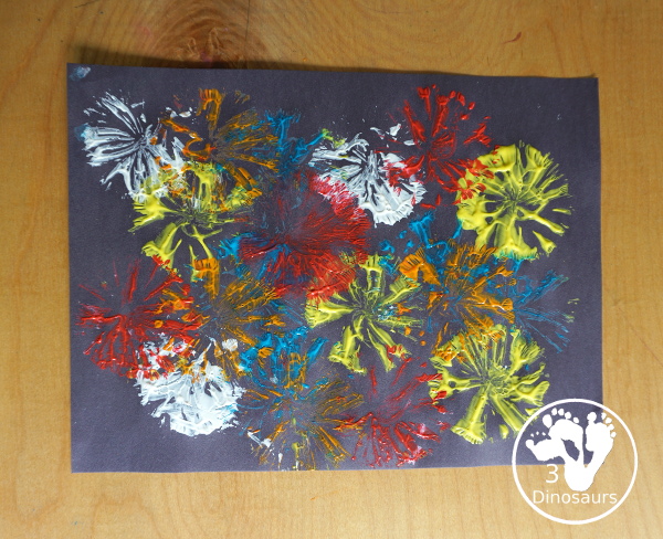 Firework Painting with String Balls - with a simple rubber band string ball painting with different colors and great for the Fourth of July and any Firework themes. And also works for the Opening Ceremony for the Olympics