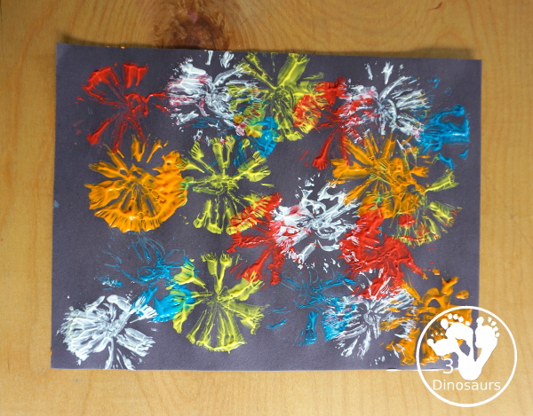 Firework Painting with String Balls - with a simple rubber band string ball painting with different colors and great for the Fourth of July and any Firework themes. And also works for the Opening Ceremony for the Olympics