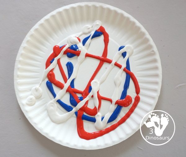 Red, White, and Blue Stamping - a simple painting with cookie cutters that you can do with kids using a flag shape and starts for the Fourth of July. - 3Dinosaurs.com