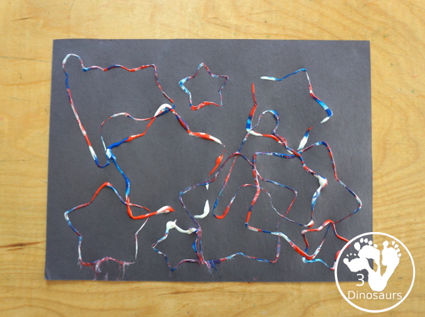 Red, White, and Blue Stamping - a simple painting with cookie cutters that you can do with kids using a flag shape and starts for the Fourth of July. - 3Dinosaurs.com