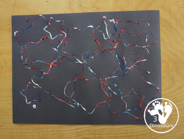 Red, White, and Blue Stamping - a simple painting with cookie cutters that you can do with kids using a flag shape and starts for the Fourth of July. - 3Dinosaurs.com