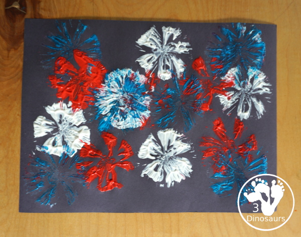 Red White and Blue Firework Painting - a fun painting to do for the Fourth of July with red, white and blue colors on black paper - 3Dinosaurs.com