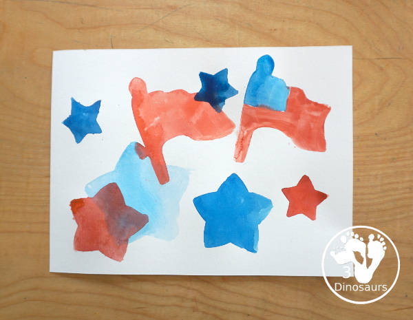 Stars & Flag Watercolor Painting with Cookie Cutters - a simple painting activity that you can do with kids with red and blue colors painting inside stars and flags.- 3Dinosaurs.com