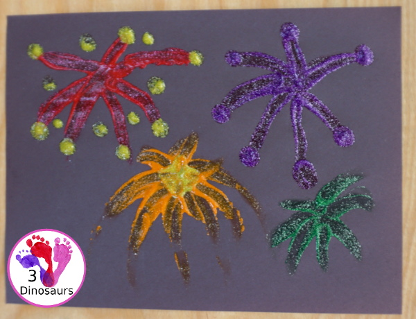 Finger Painting Fireworks with Glitter Paint for kids - easy and fun sensory painting activity that is a great way to make fireworks. - 3Dinosaurs.com