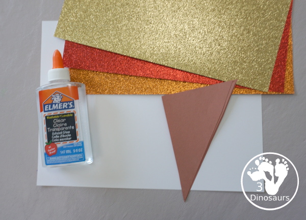 Glitter Olympic Torch Craft with Torn Paper Art - is an easy to make torn paper craft for the Olympics that kids can make - 3Dinosaurs.com