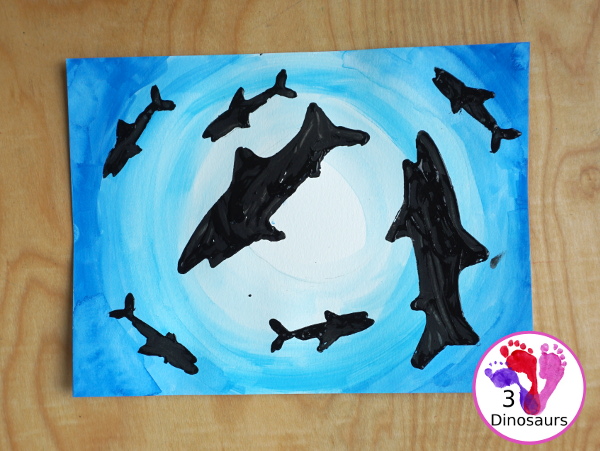 Shark Cookie Cutter Painting with Q-tip & Watercolors - a fun painting activity that kids of different ages can do. It is a fun way to work on colors and fine motor painting with q-tips and watercolors - 3Dinosaurs.com