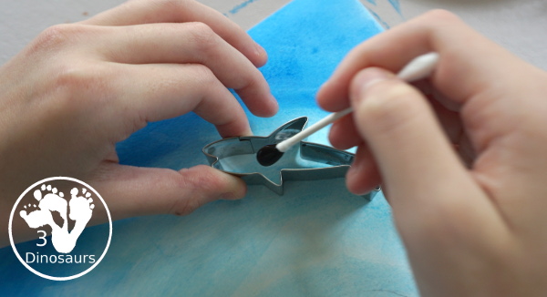 Shark Cookie Cutter Painting with Q-tip & Watercolors - a fun painting activity that kids of different ages can do. It is a fun way to work on colors and fine motor painting with q-tips and watercolors - 3Dinosaurs.com