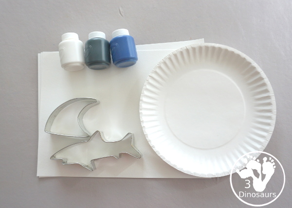 Shark Cookie Cutter Painting - a great painting activity for kids of all ages and works great with tot and preschool age kids for a shark paint activity - 3Dinosaurs.com