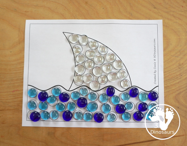 Free Shark Fin Fine Motor Mat Printables - three fun shark fine motor mats with a shark fin template printable, shark find tracing printable, and shark fin dot marker printable - 3Dinosaurs.com