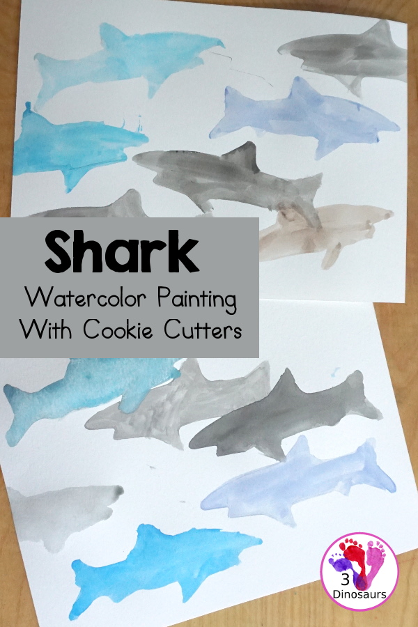 Shark Watercolor Painting with Cookie Cutters - a fun shark painting activity that you can do with kids for shark week. You use shark cookie cutter and watercolors - 3Dinosaurs.com