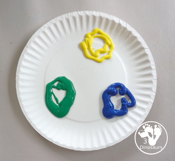 Paper Roll Olympic Flag Ring Color Painting - a fun Olympic art activity using the Olympic Ring colors. - 3Dinosaurs.com