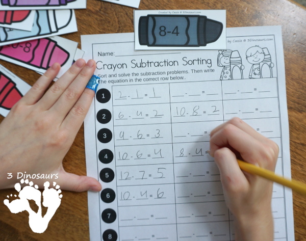 Free Crayon Themed Subtraction Sorting - working on 3 equations for each number on the crayon box with a recording worksheet - 3Dinosaurs.com