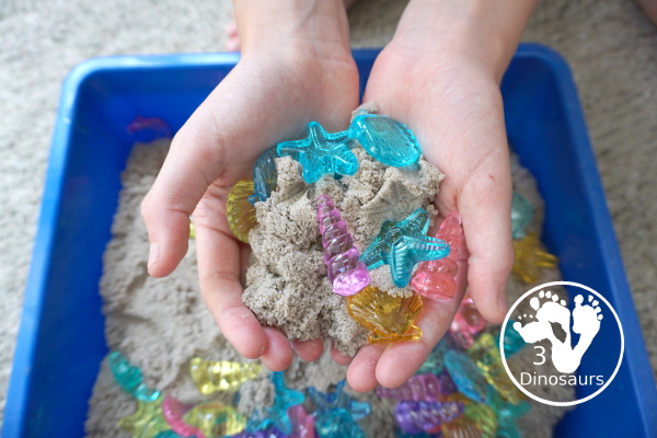 Beach Kinetic Sand & Shell Sensory Bin - for an easy to set up sensory play that kids can do any time of the year and work great for a beach theme day - 3Dinosaurs.com