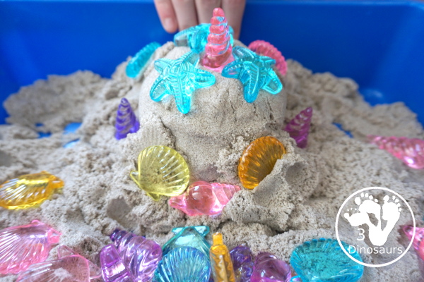 Beach Kinetic Sand & Shell Sensory Bin - for an easy to set up sensory play that kids can do any time of the year and work great for a beach theme day - 3Dinosaurs.com