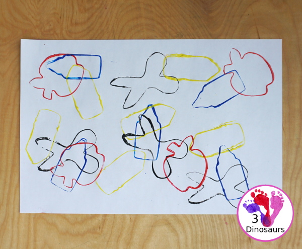 School Cookie Cutter Painting - with stamping school themes of pencils, scissors, crayons and apples with paint on paper for a great back to school painting - 3Dinosaurs.com