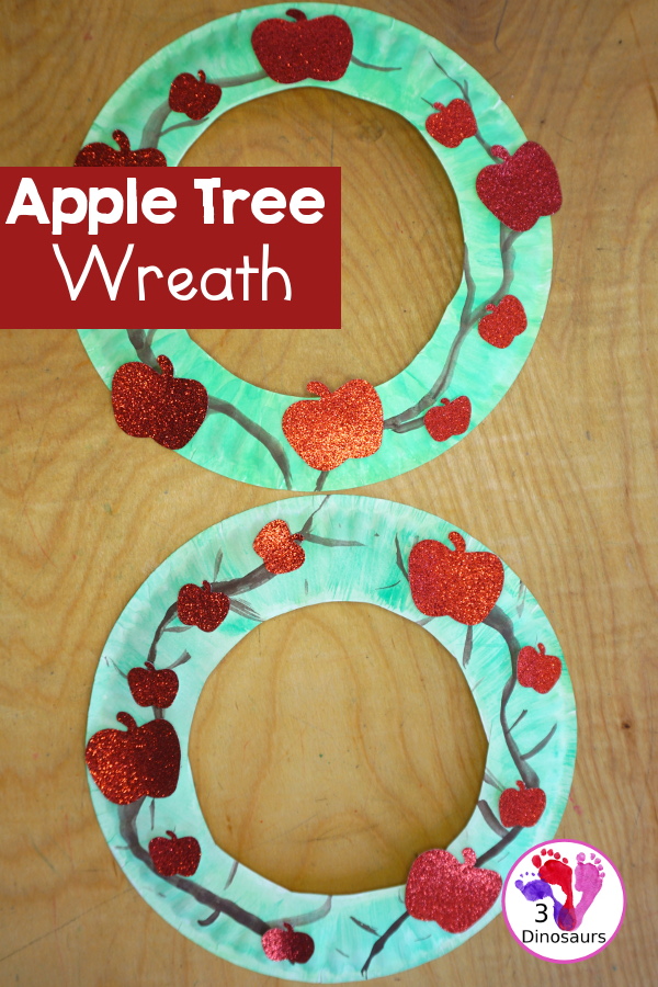 Apple Tree Wreath Craft for kids with paper plate, watercolor, and apple punches to use to make this fun wreath for fall with a fun apple theme - 3Dinosaurs.com