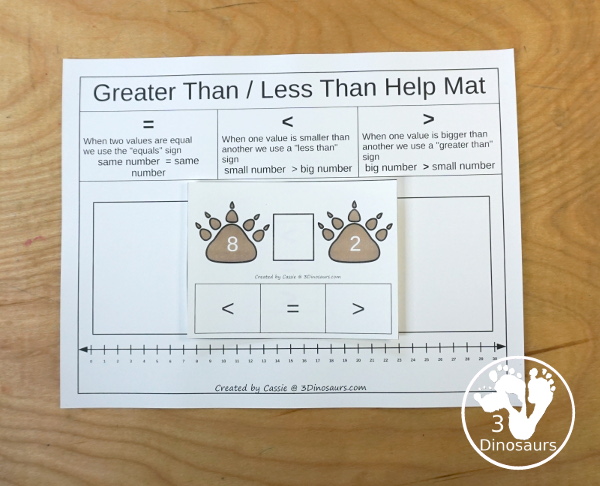 Free Bear Print Greater Than and Less Than Printable - a fun set of cards that work on comparing the numbers with greater than, less than, and equal with numbers 1 to 30 and bear paw counting help for the cards. - 3Dinosaurs.com