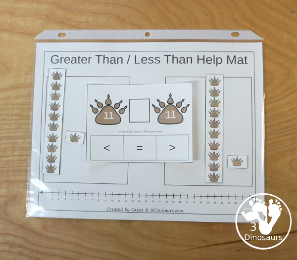 Free Bear Print Greater Than and Less Than Printable - a fun set of cards that work on comparing the numbers with greater than, less than, and equal with numbers 1 to 30 and bear paw counting help for the cards. - 3Dinosaurs.com