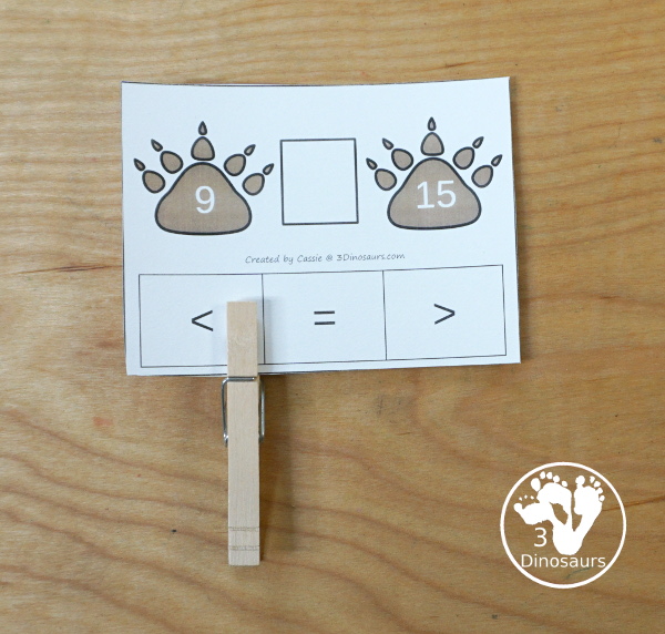 Free Bear Print Greater Than and Less Than Printable - a fun set of cards that work on comparing the numbers with greater than, less than, and equal with numbers 1 to 30 and bear paw counting help for the cards. - 3Dinosaurs.com