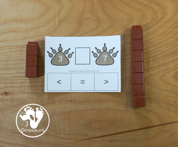 Free Bear Print Greater Than and Less Than Printable - a fun set of cards that work on comparing the numbers with greater than, less than, and equal with numbers 1 to 30 and bear paw counting help for the cards. - 3Dinosaurs.com