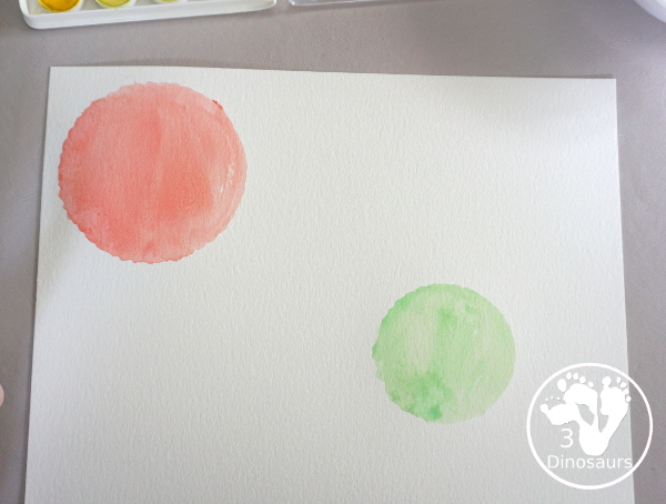 Circle Watercolor Painting with Cookie Cutters - a is great shape painting you can do with kids. You can use different sizes of cookie cutters for it and paint inside the cookie cutter to get the shape. - 3Dinosaurs.com