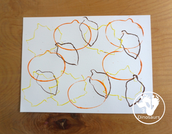 Fall Cookie Cutter Painting - with  acorns, pumpkins and a leaf. Great fun theme for fall! A great painting idea for preschool and prek. 3Dinosaurs.com