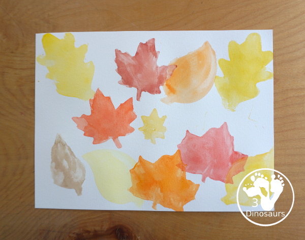 Leaves Cookie Cutter Painting - a fun fall painting with leaves. You can use a mix of red, yellow, orange and brown colors with this watercolor painting - 3Dinosaurs.com